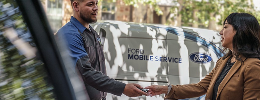 2023 Ford mobile service van with two people in front of it