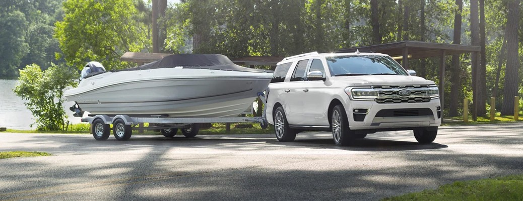 2023 Ford Expedition front view with a boat