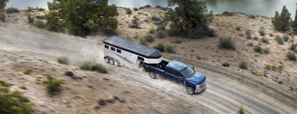 A Ford Super Duty towing a big trailer overhead view