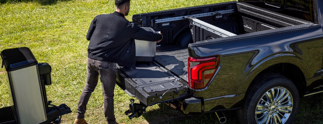 2024 Ford F-150 with a man using the tailgate