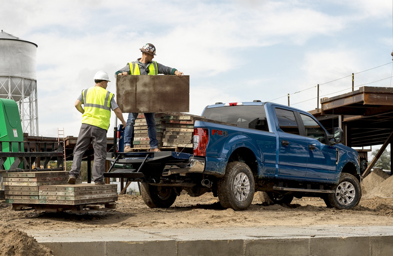 2020 Ford Super Duty F-250 with workers on a work site