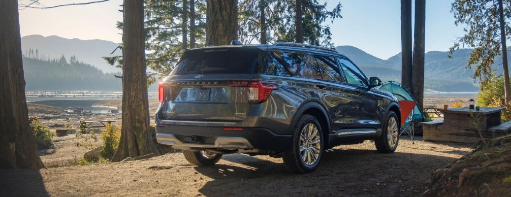 2025 Ford Explorer Platinum rear view by trees