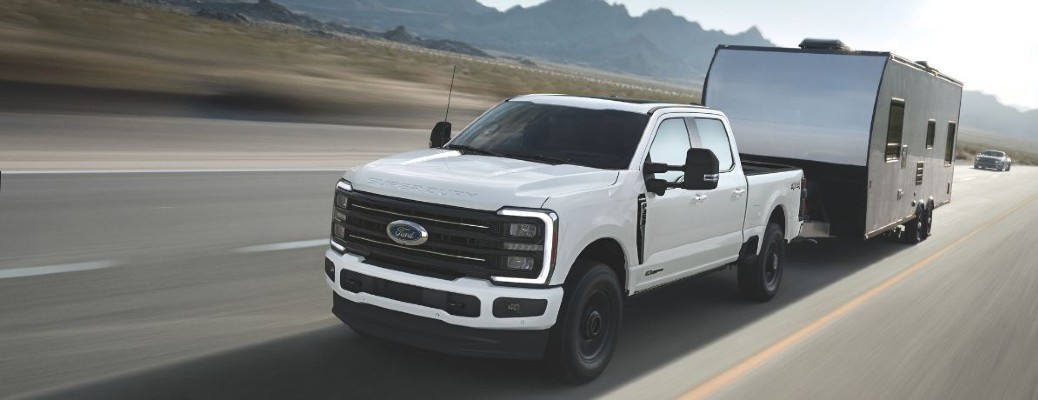 2025 Ford Super Duty truck towing a trailer