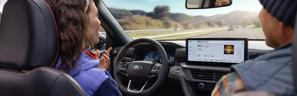 a person using hands-free highway driving