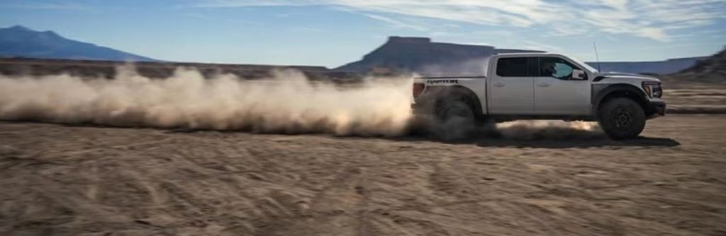 2025 Ford F-150 Raptor side view on sand
