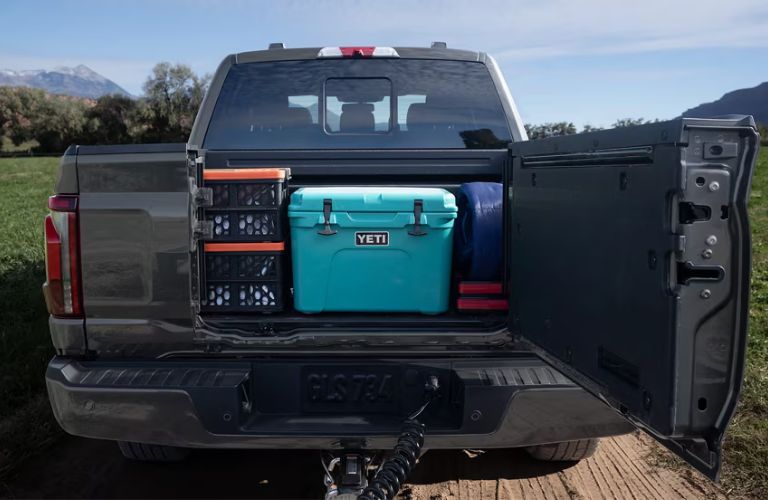 2025 Ford F-150 rear view with items in the bed