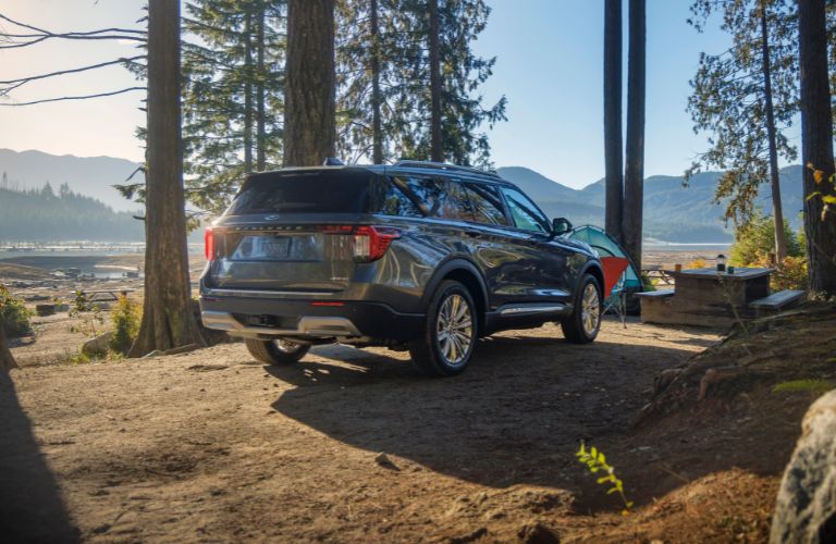 2025 Ford Explorer rear view in a forest