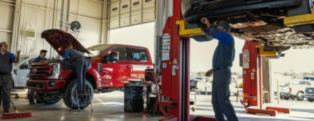 A Ford service center with vehicles getting serviced
