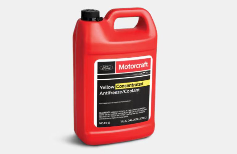a Motorcraft red jug of antifreeze coolant