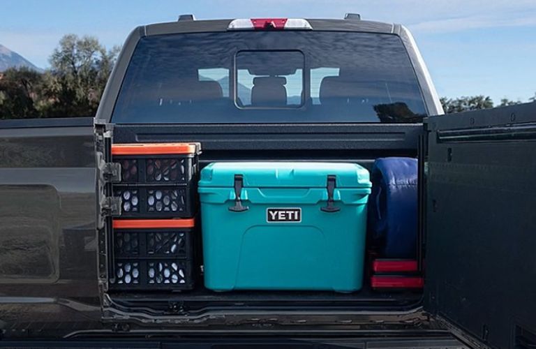 2026 Ford F-150 rear cargo bed with a cooler in it