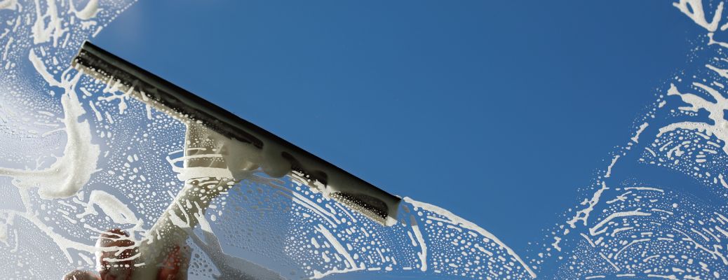 close up of a window being cleaned
