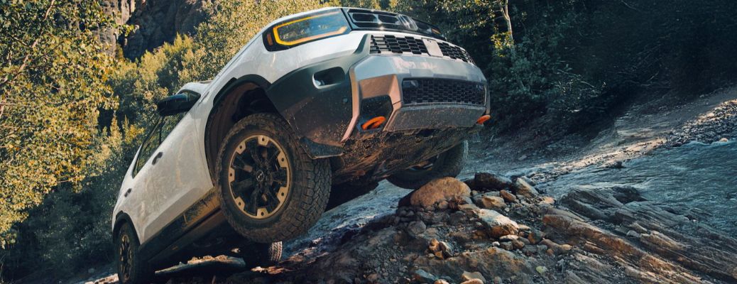 front view of the 2026 Honda Passport parked on rocks