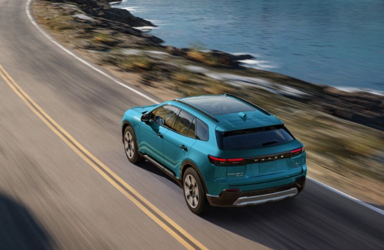 top view of a Honda EV going away on the road