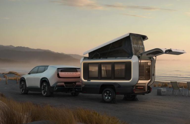 side and rear view of the Honda lightweight towable travel trailer with its roof open