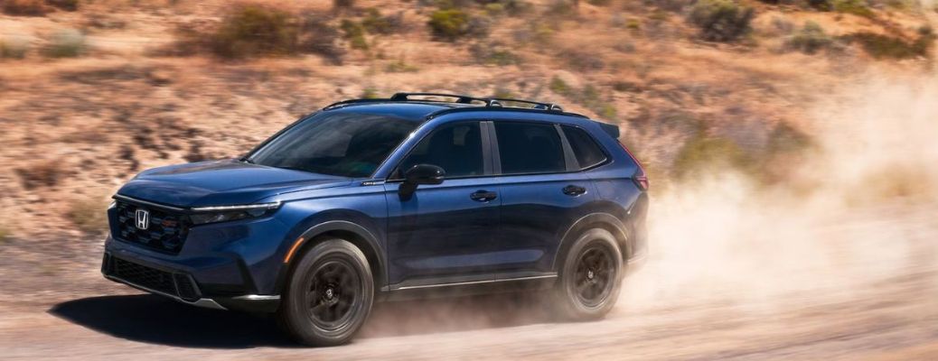 2026 Honda CR-V Hybrid Blue off-roading