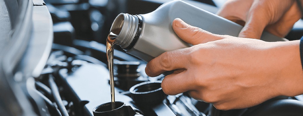 Mechanic changing oil