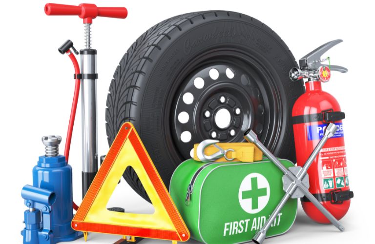 Representative image of various items needed in an Emergency Car Kit