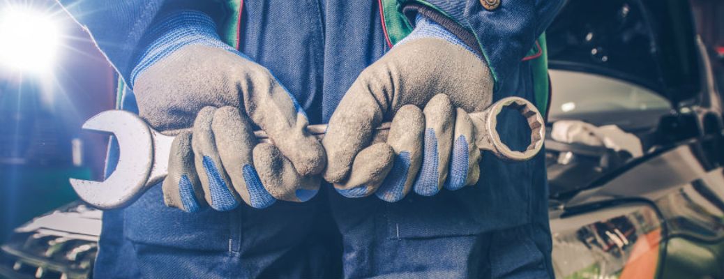 Representative image of a technician with a tool
