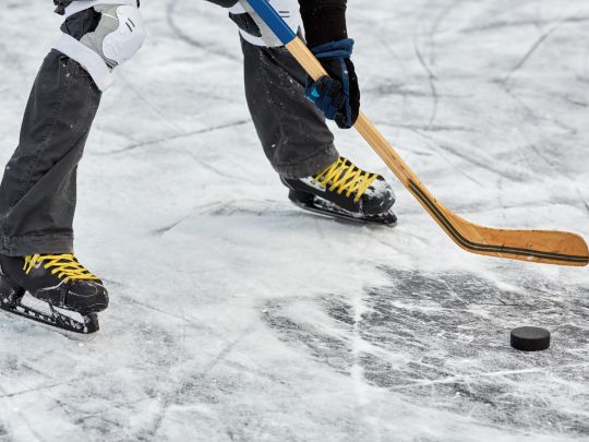 Person playing hockey