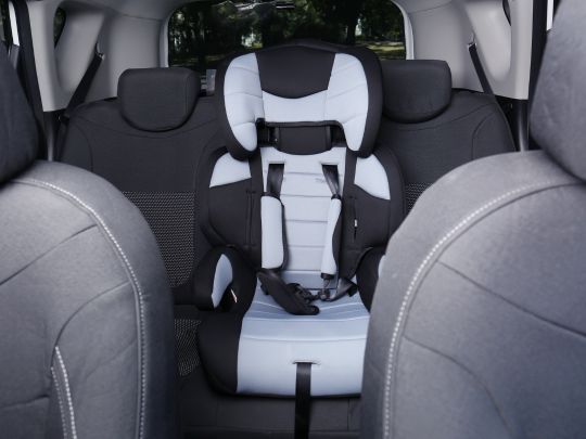 Child safety seat in a car