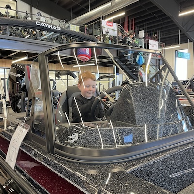 A boat on display at the Sherwood Powersports & Marine grand opening