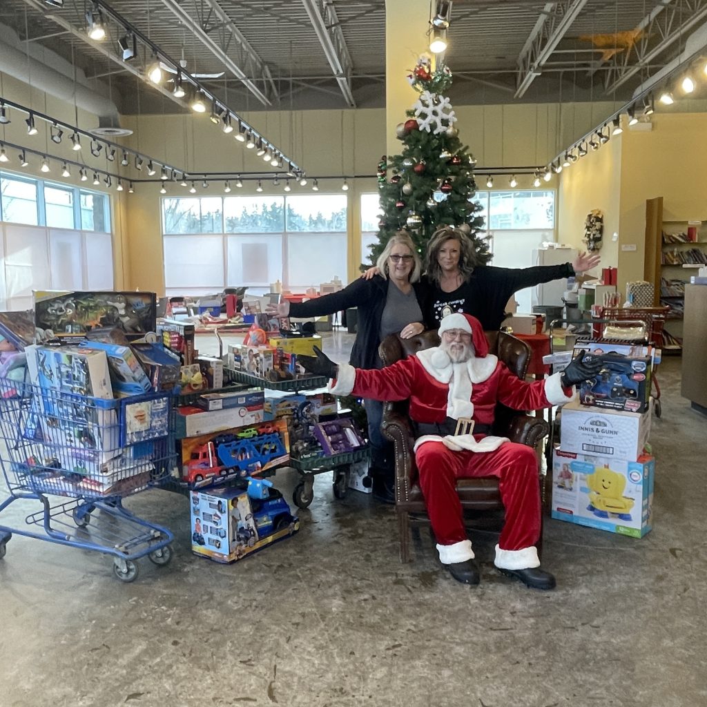 Santa Claus spreading holiday cheer at Sherwood Ford with toy donations