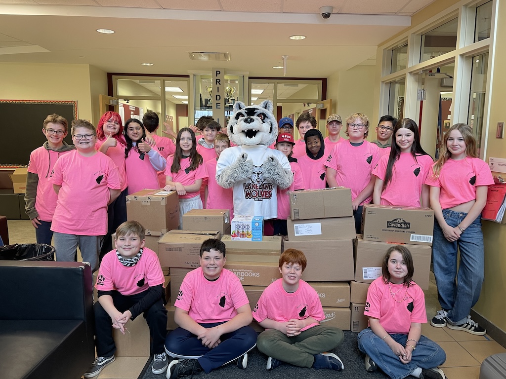 The students of Lakeland Ridge School with hundreds of pounds of food donated