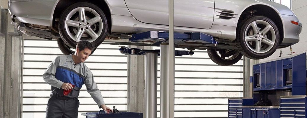 Mechanic working on a car
