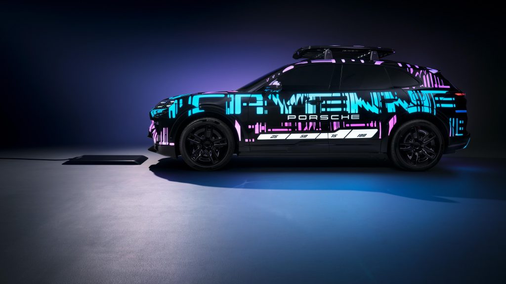 camouflaged cayenne electric showing off porsche's new wireless charging technology