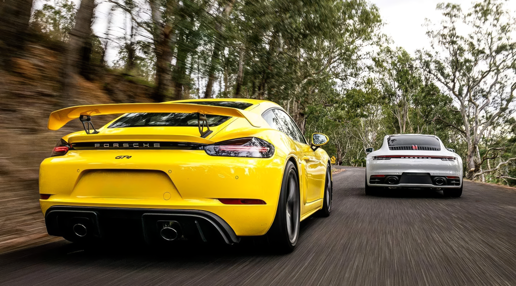 Cayman vs 911, Porsche Cayman vs 911, 718 Cayman vs 911 Carrera, which Porsche to buy, Cayman or 911, Porsche sports car comparison, mid-engine vs rear-engine Porsche, Champion Porsche Cayman 911
