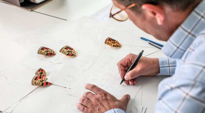 The Evolution of the Porsche Logo: 75 Years of Iconic Design | Champion ...