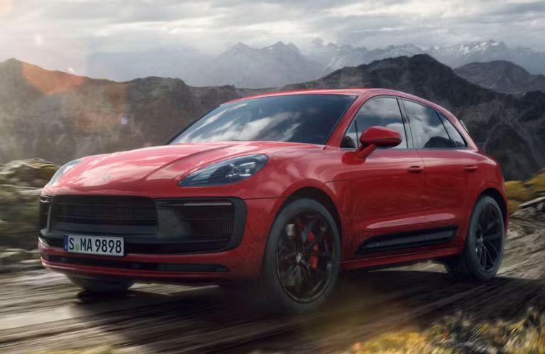 2026 Porsche Macan GTS Red on the road