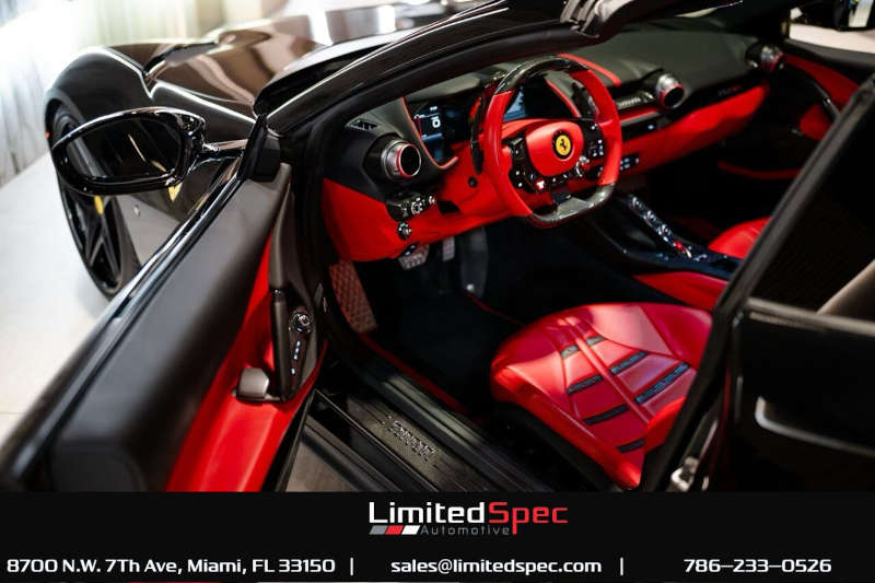 The driver's side of the interior of the 2021 Ferrari 812 GTS for sale at Limited Spec Automotive in Miami, FL