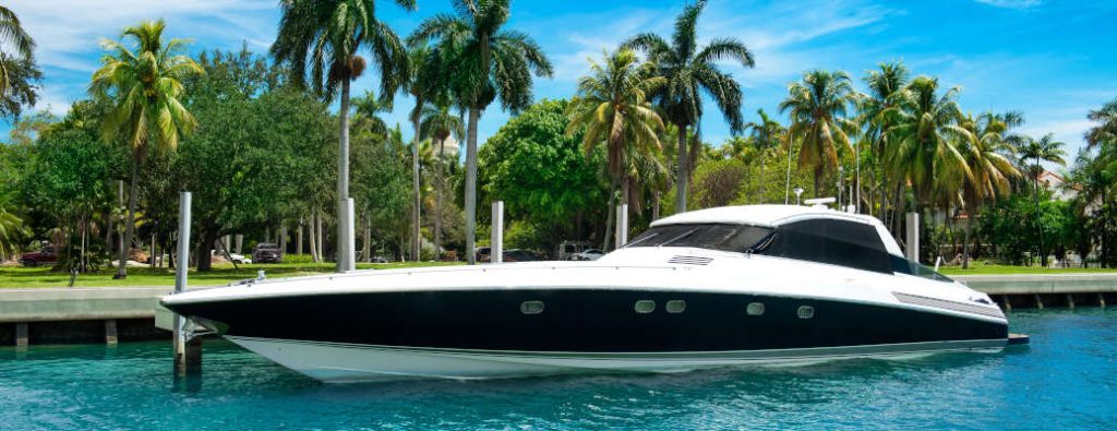 Luxury speed yacht near tropical island in Miami, Florida