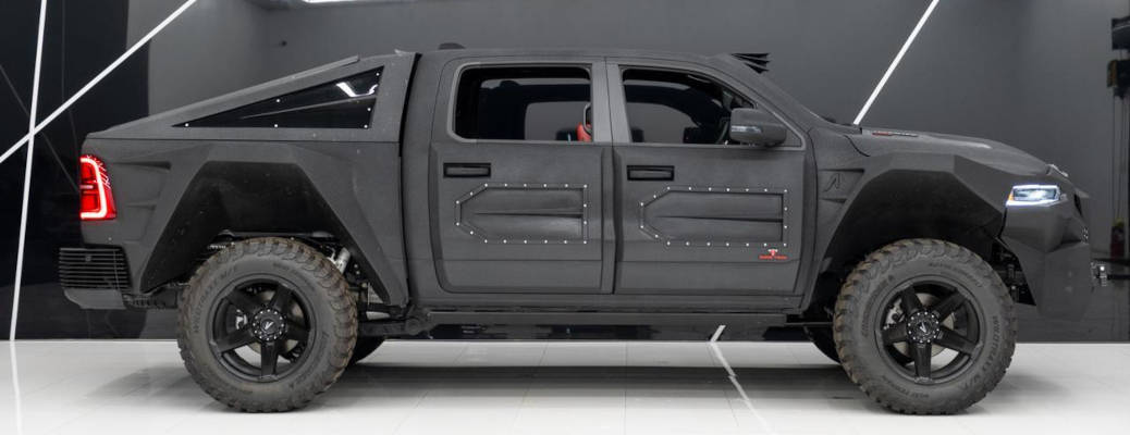 A side exterior view of the Used 2025 Ram 1500 RHO Apocalypse SuperTruck customized by the masters at SoFlo.