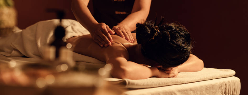A woman getting a massage at one of the most luxurious spas in Miami