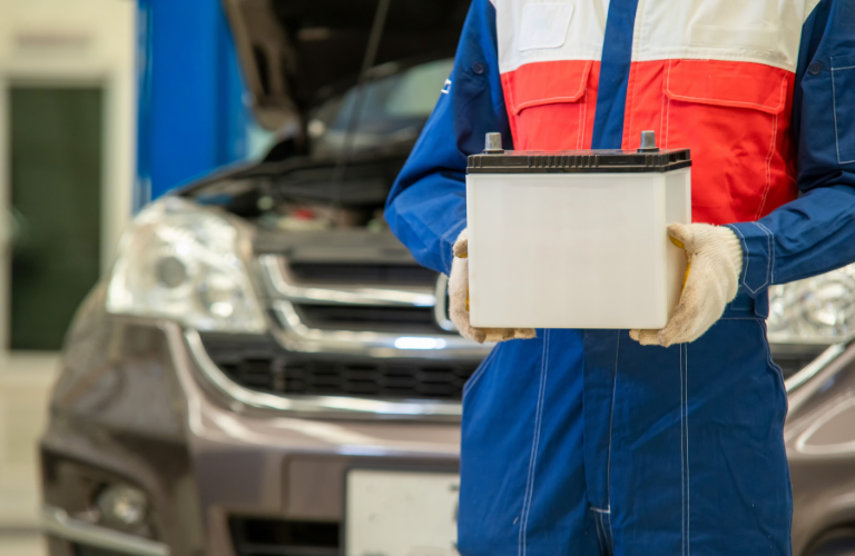 Man holding a battery