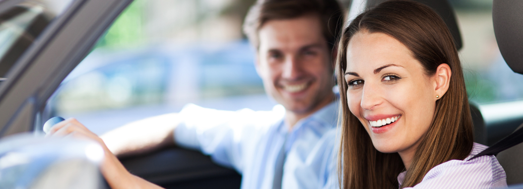 A couple traveling in a vehicle