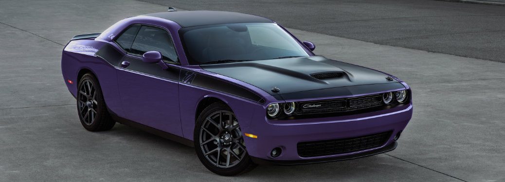 2018 Dodge Challenger in Plum Crazy seen from the side and front