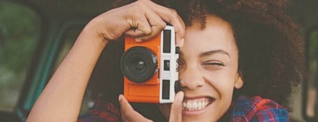 a woman snapping a photo