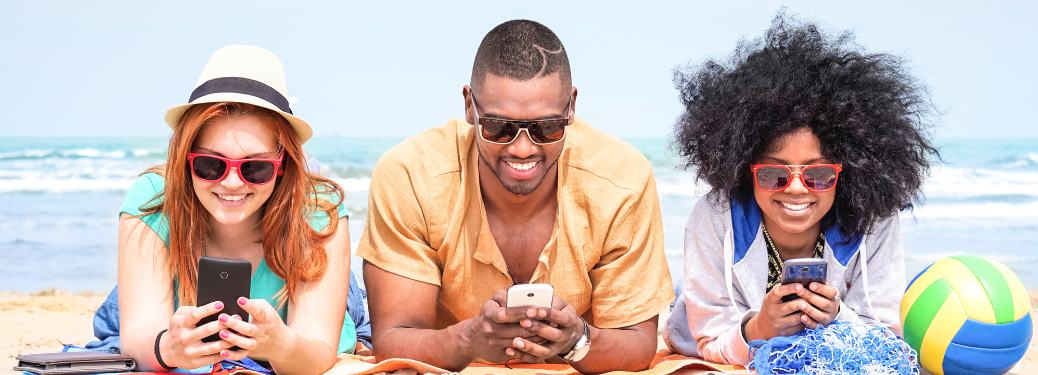 A group of friends chilling by the beach