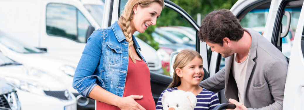 A family near a car