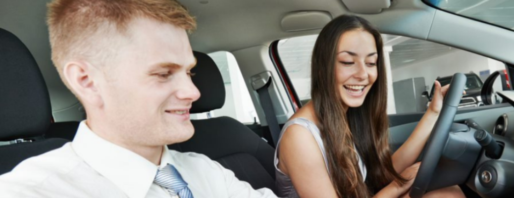 Customer and salesperson in a car