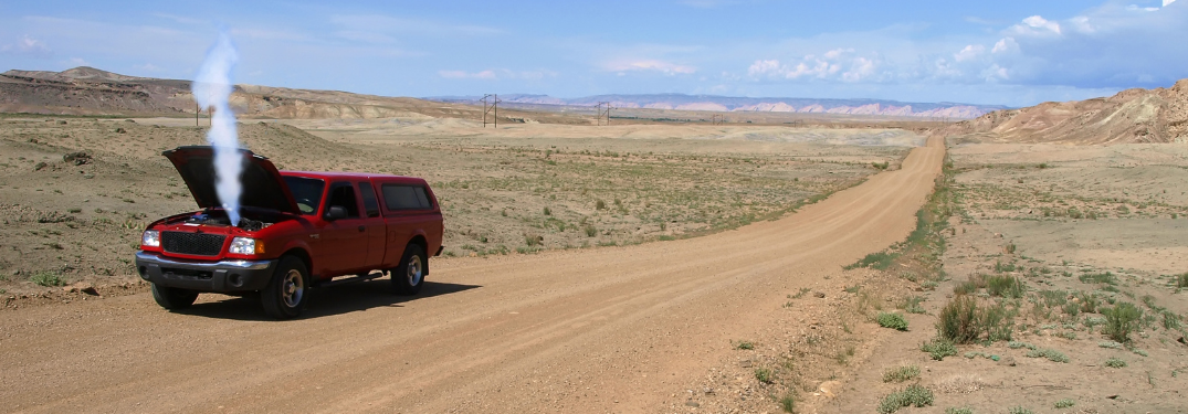 What can cause a warped cylinder head?