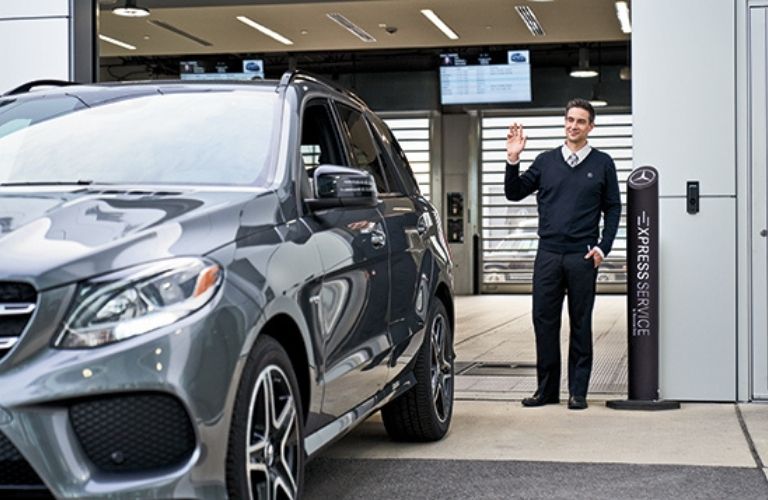 Person waving their hand