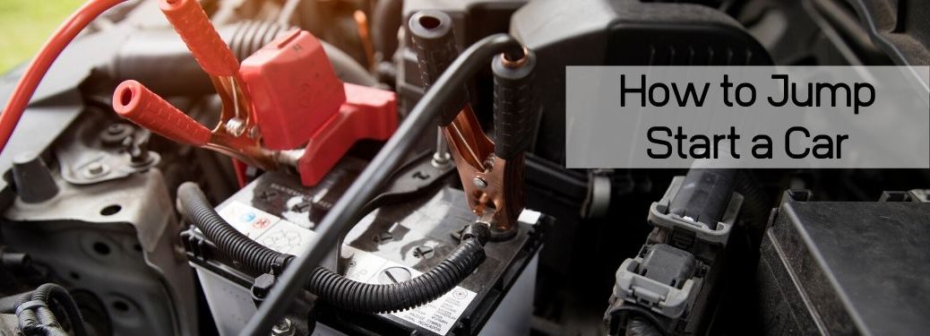 Jumper cables on battery with How to Jump Start a Car in text to the right