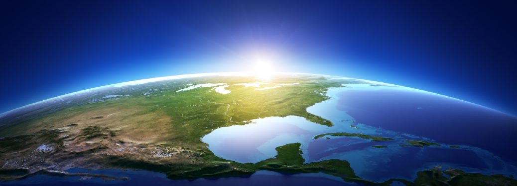 A sunrise over the planet earth as seen from space.