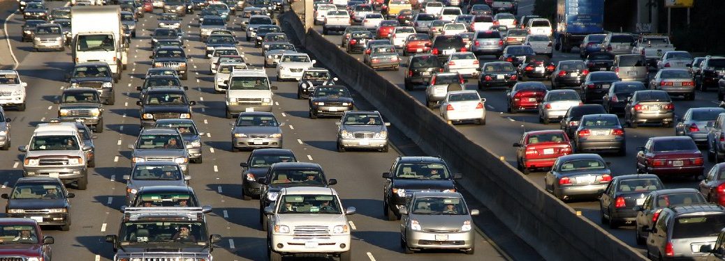 Many cars travel on a highway