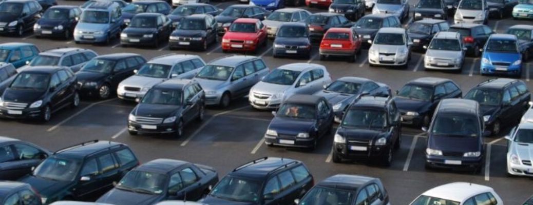 Multiple used cars parked