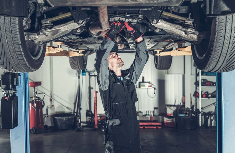 Mechanic working on a vehicle
